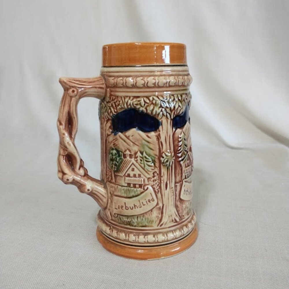 BEER STEIN - This is a German-style beer stein with a wrap-around scene